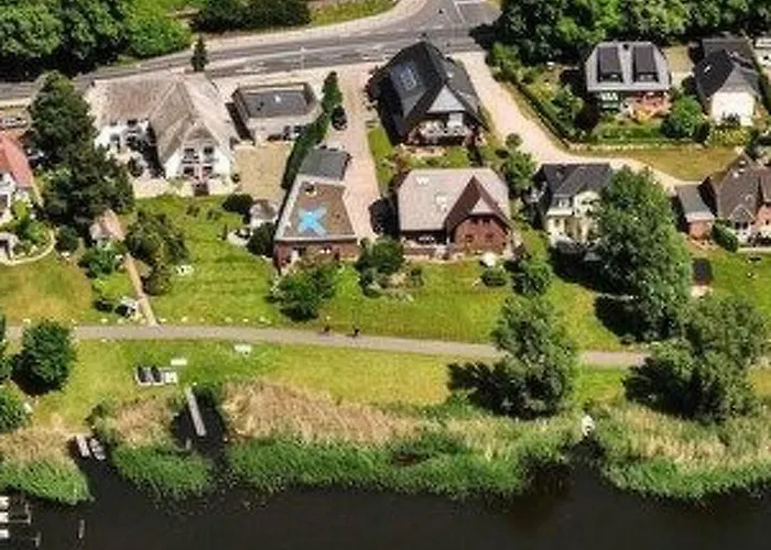 Ferienbungalow Mit Terrasse Und Seeblick In By Interhome *